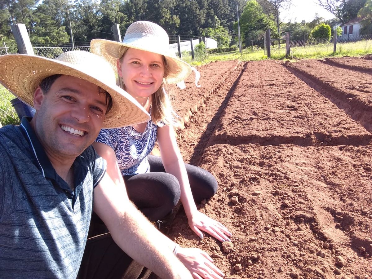 Gerusa and Ricardo working in the Field